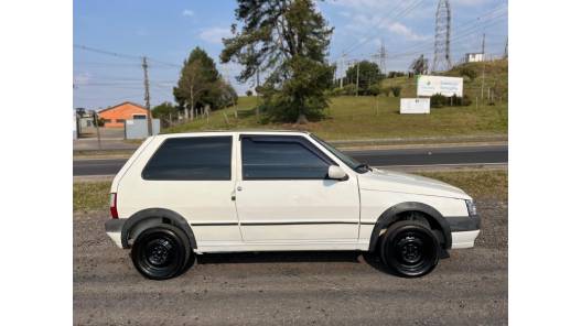 FIAT - UNO - 2010/2011 - Branca - R$ 21.000,00